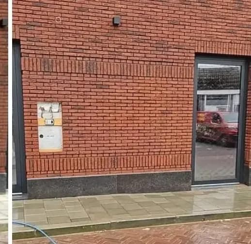 Dezelfde bakstenen gevel schoon nadat VLM Schoonmaak de graffiti heeft verwijderd